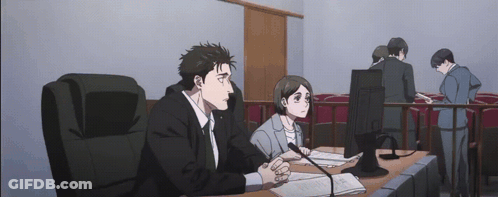 Man And Woman Sitting In Courtroom GIF