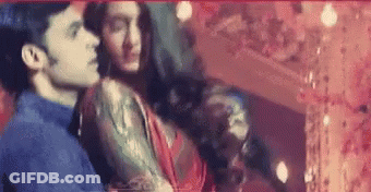 Man And Woman Sitting In Dark Room GIF