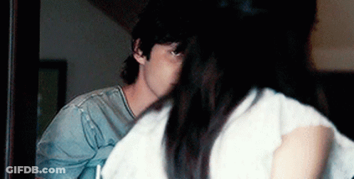 Man And Woman Sitting In Dark Room GIF
