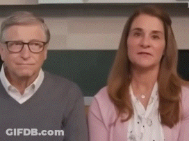 Man And Woman Sitting In Kitchen GIF