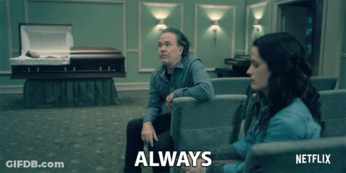 Man And Woman Sitting In Netflix Ad GIF