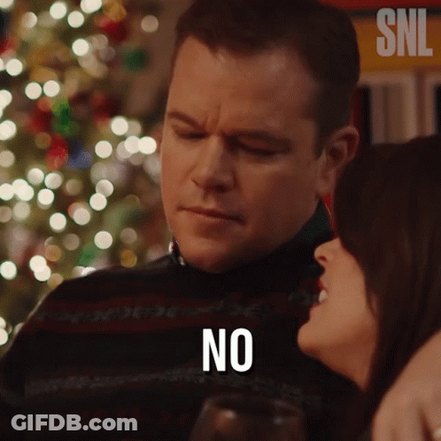 Man And Woman Sitting Man Saying No GIF
