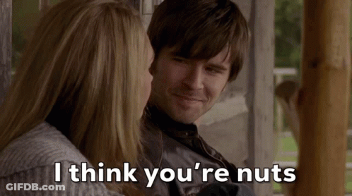 Man And Woman Sitting Man Says I Think You're Nuts GIF
