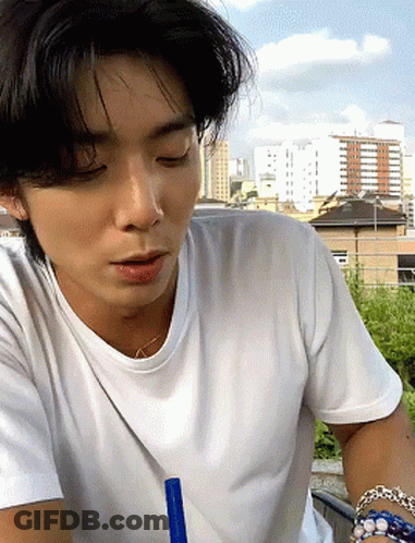 Man And Woman Sitting, Man With Neck Microphone GIF