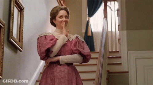 Man And Woman Sitting Next To Each Other GIF