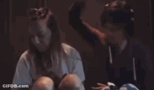 Man And Woman Sitting Next To Each Other GIF