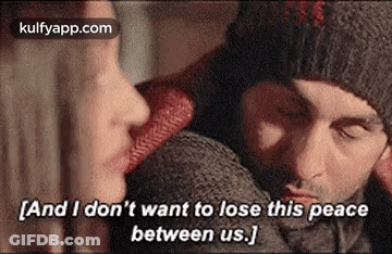Man And Woman Sitting Next To Each Other GIF