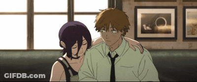 Man And Woman Sitting Next To Each Other GIF