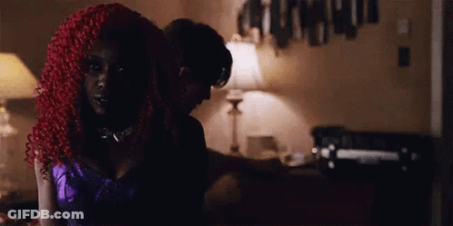 Man And Woman Sitting On Bed GIF