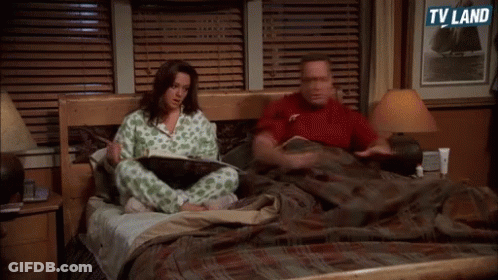 Man And Woman Sitting On Bed TV Land GIF