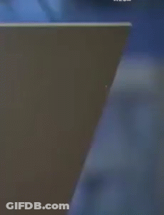 Man And Woman Sitting On Couch GIF
