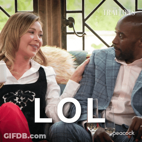 Man And Woman Sitting On Couch Saying LOL GIF
