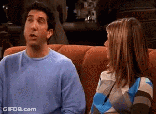 Man And Woman Sitting On Couch Talking GIF