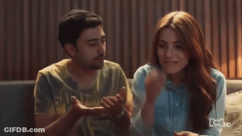 Man And Woman Sitting On Couch With HD GIF