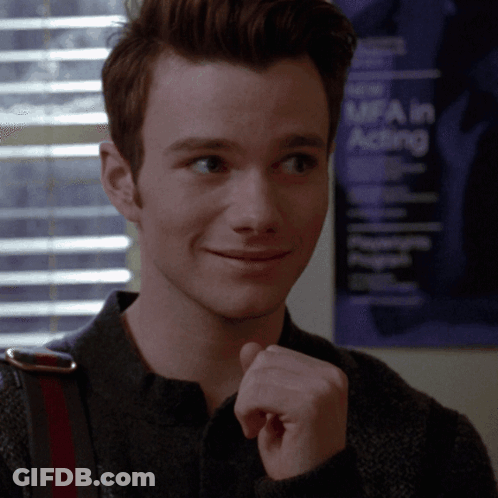 Man And Woman Sitting On Couch Woman Covering Mouth GIF