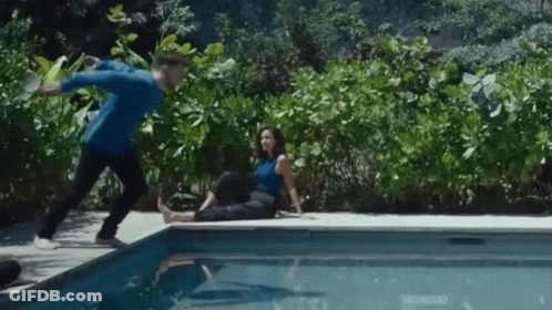 Man And Woman Sitting Pool Edge GIF