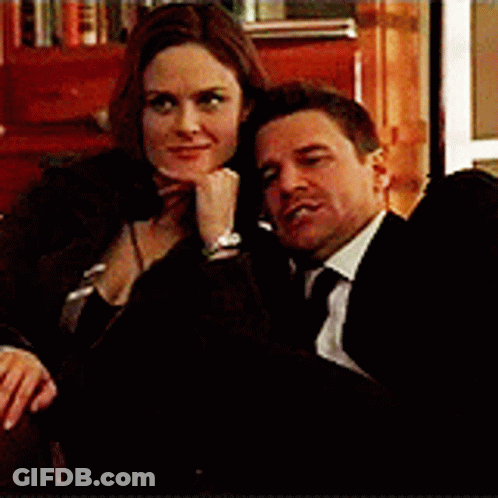 Man And Woman Sitting Together GIF