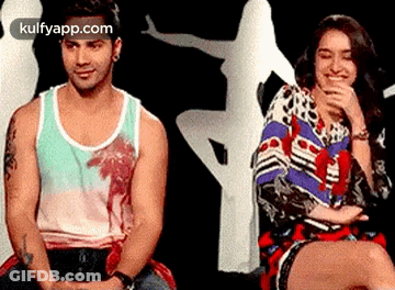Man And Woman Sitting Together In Room GIF