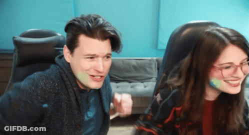 Man And Woman Sitting Together GIF