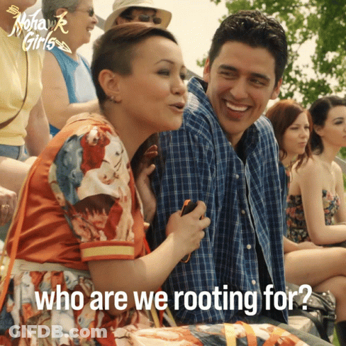 Man And Woman Sitting Together Who Are We Rooting For GIF