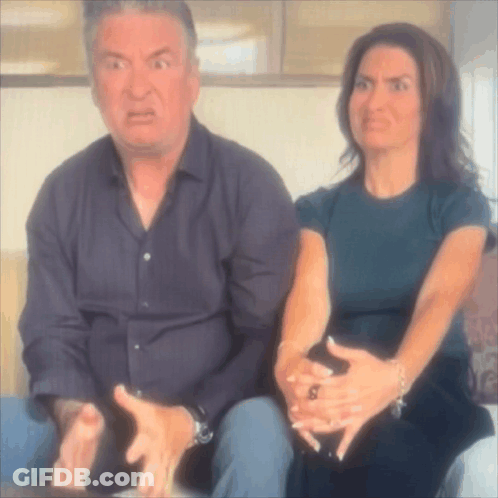 Man And Woman Sitting Together Woman Making Funny Face GIF