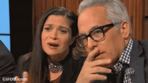 Man And Woman Sitting Woman Crying Man With Glasses GIF
