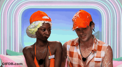 Man And Woman Sitting, Woman In Bathing Cap GIF