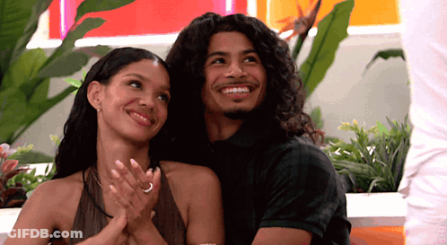 Man And Woman Smiling And Clapping GIF