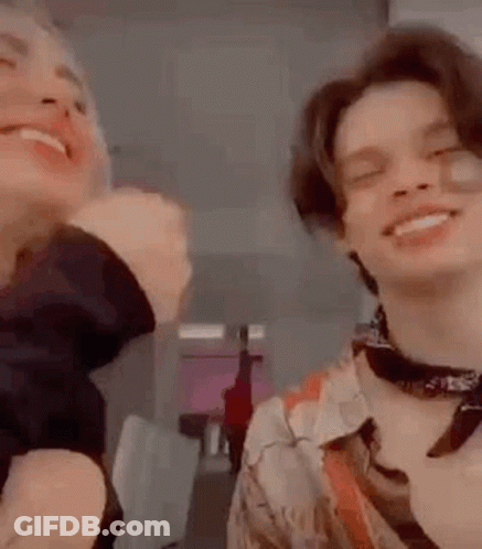Man And Woman Smiling And Laughing GIF