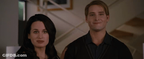 Man And Woman Smiling At Camera GIF