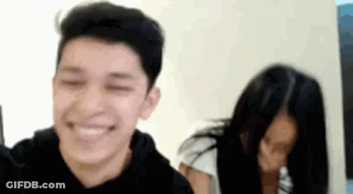 Man And Woman Smiling At Camera GIF