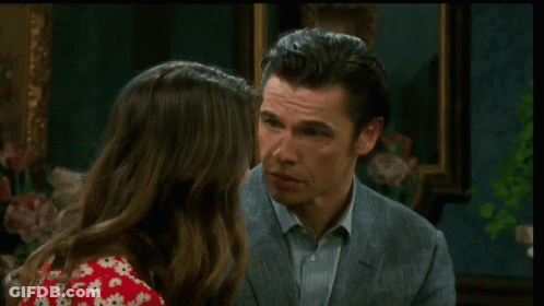 Man And Woman Smiling At Each Other GIF