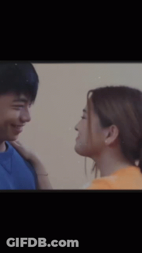 Man And Woman Smiling At Each Other GIF