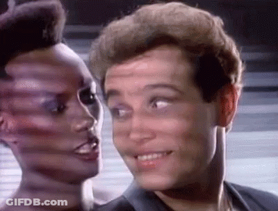 Man And Woman Smiling At Each Other GIF