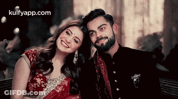 Man And Woman Smiling For Camera GIF