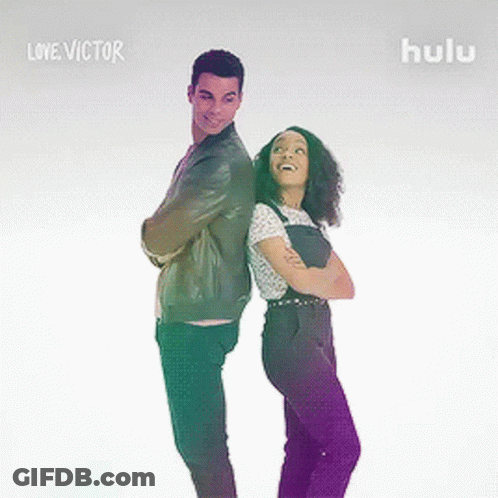 Man And Woman Standing Back To Back GIF