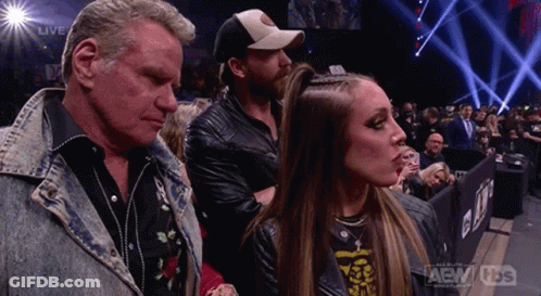Man And Woman Standing Beside In Stadium GIF