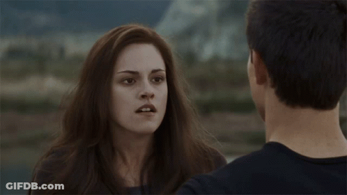 Man And Woman Standing Beside Mountains GIF