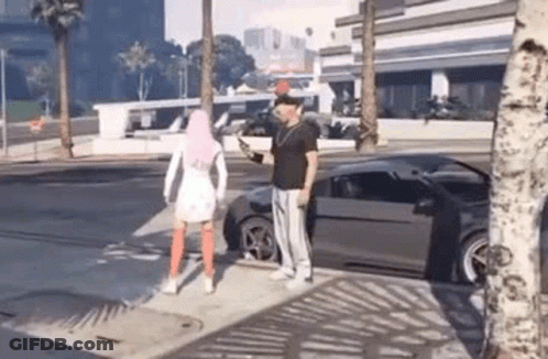 Man And Woman Standing By Car On Sidewalk GIF