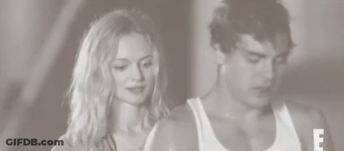 Man And Woman Standing In Black And White Photo GIF