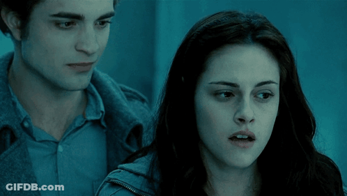 Man And Woman Standing In Blue Room GIF