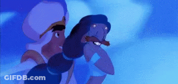Man And Woman Standing In Blue Room GIF