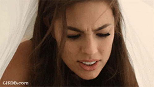 Man And Woman Standing In Crowded Area GIF