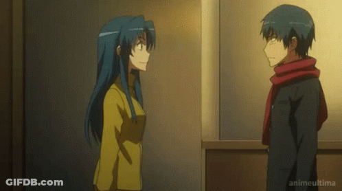 Man And Woman Standing In Dark Room GIF