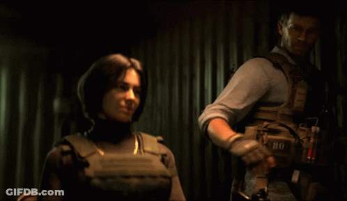 Man And Woman Standing In Dark Room GIF