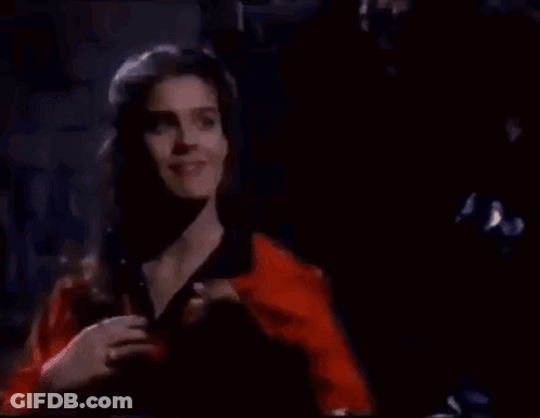 Man And Woman Standing In Dark Room GIF