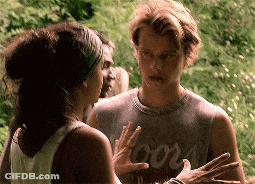 Man And Woman Standing In Forest GIF