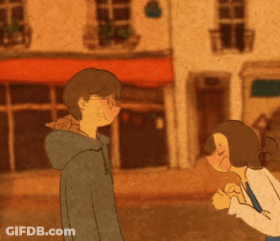 Man And Woman Standing In Front Of Building GIF