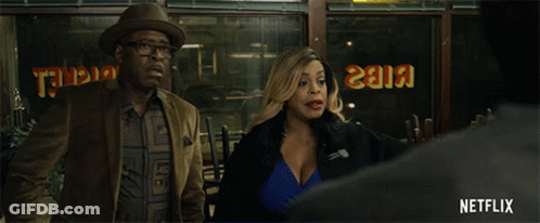 Man And Woman Standing In Front Of I Know That's Right Netflix Sign GIF