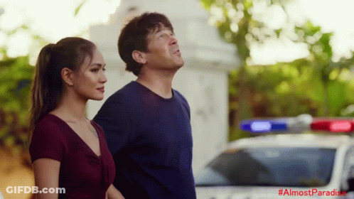 Man And Woman Standing In Front Of Police Car #AlmostParadise GIF